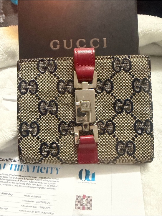 Gucci Handbags - Gucci Beige GG Canvas Wallet with Red Interior